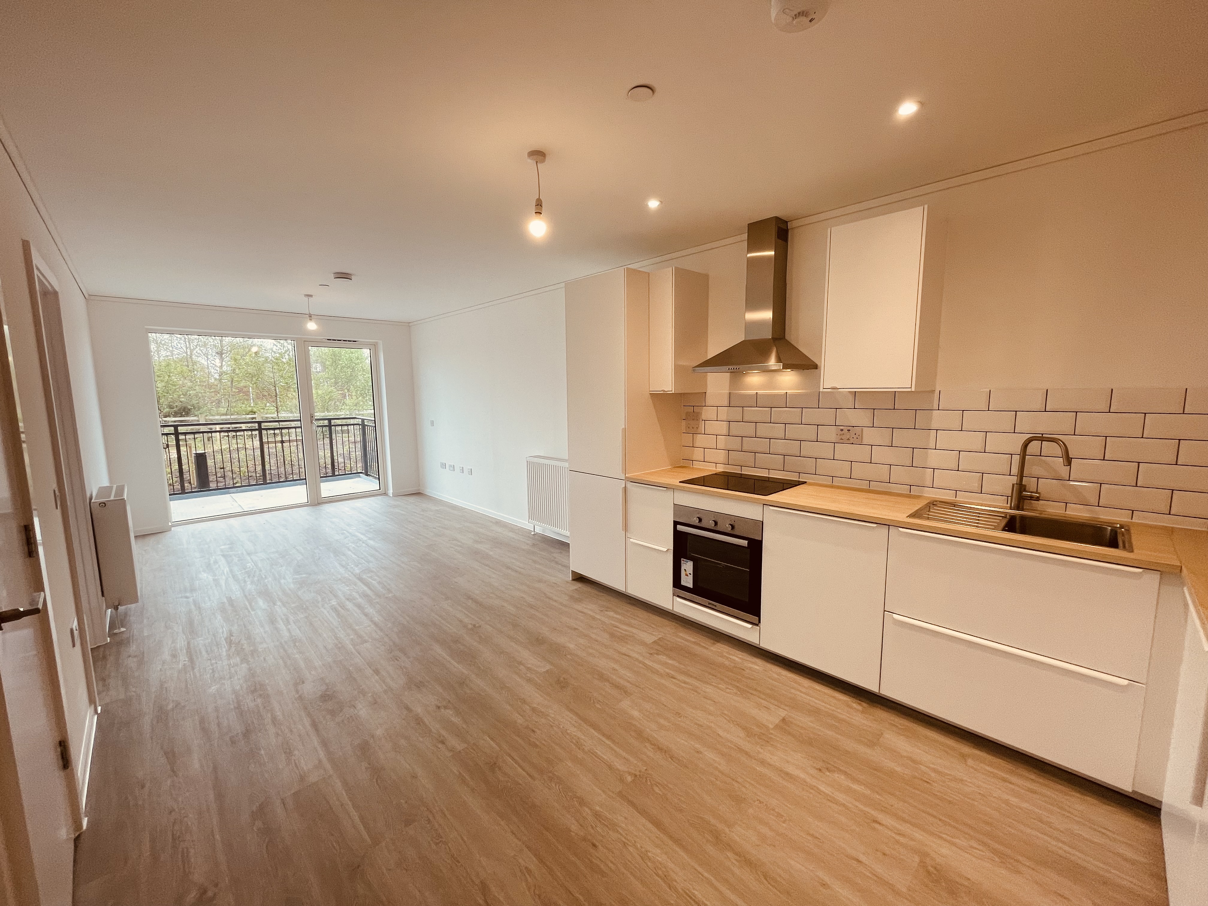 Kitchen/diner photo of a ground floor apartment at By the Park