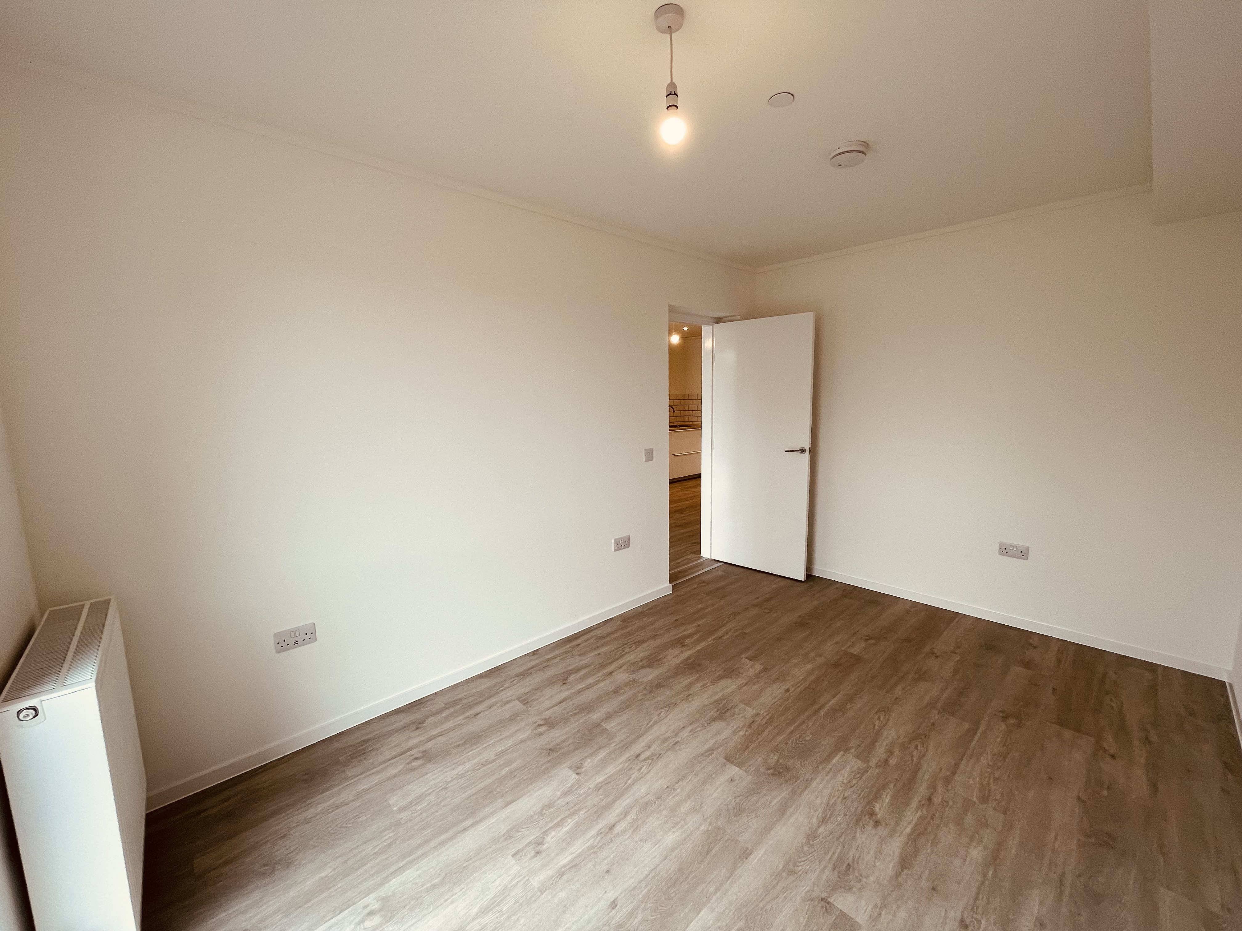 Bedroom photo of a ground floor apartment at By the Park
